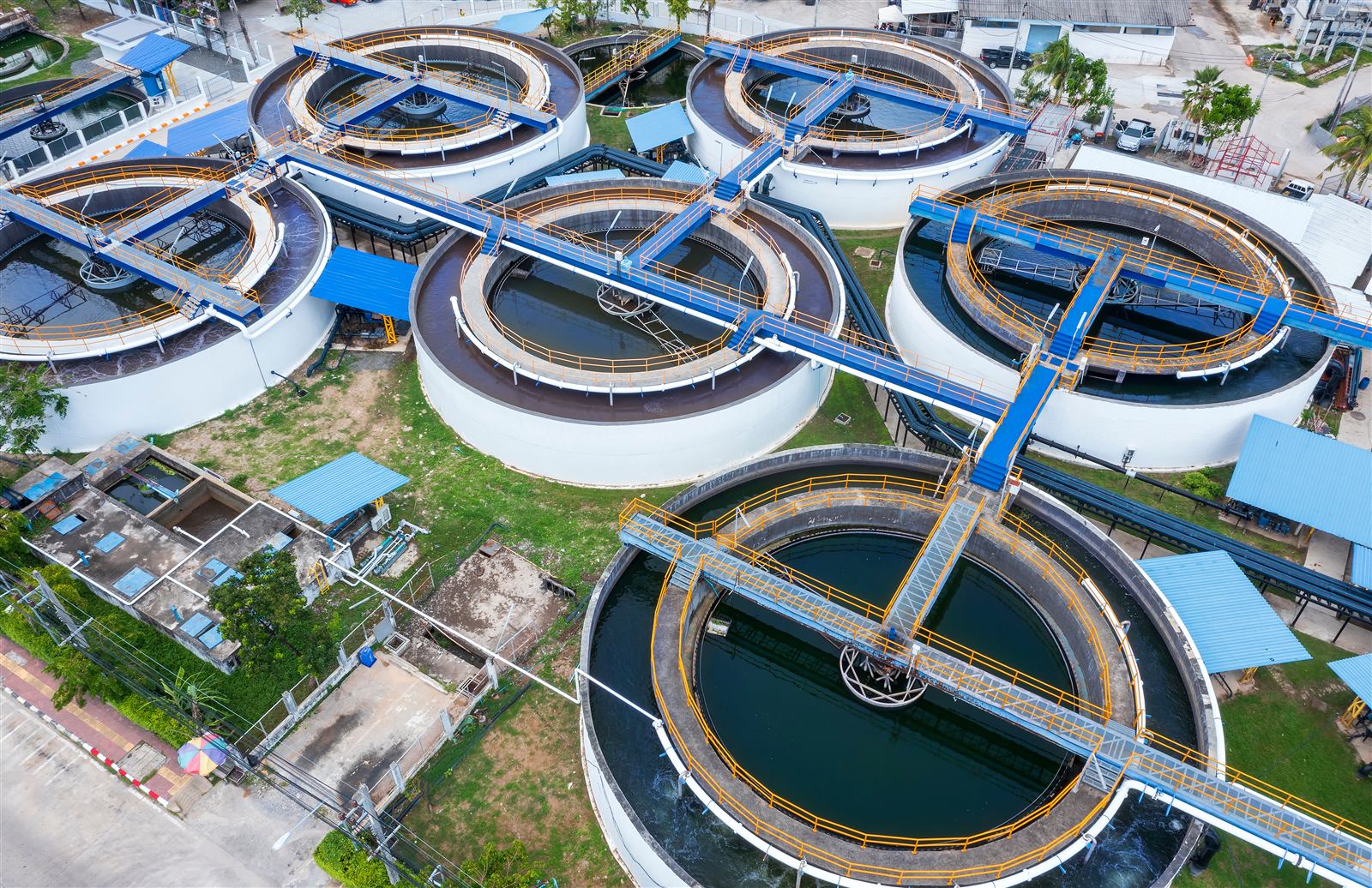 Aerial view of circular clarifier tanks at a water treatment plant
